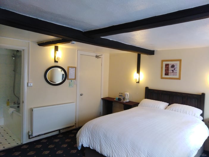 Room 5: first-floor room with a king-size double bed